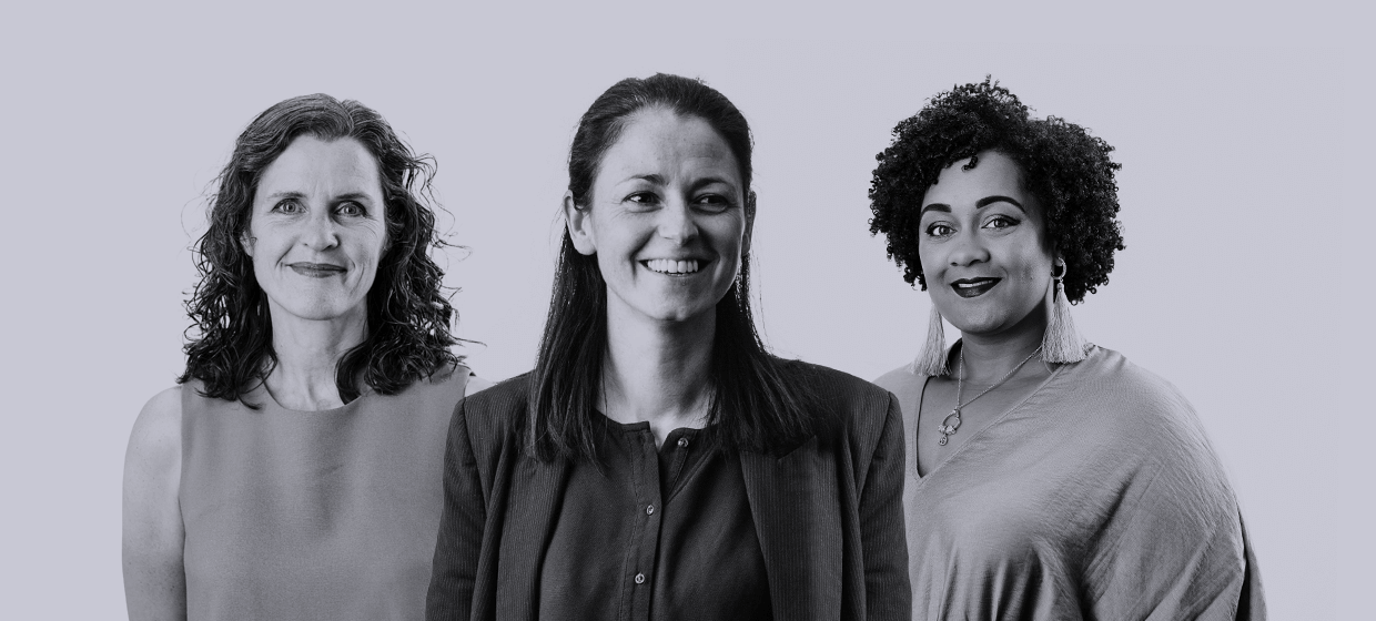 A headshot of three GatenbySanderson employees smiling to camera